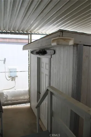 a bathroom with a shower and a sink