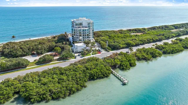 a view of a lake with a building in the background