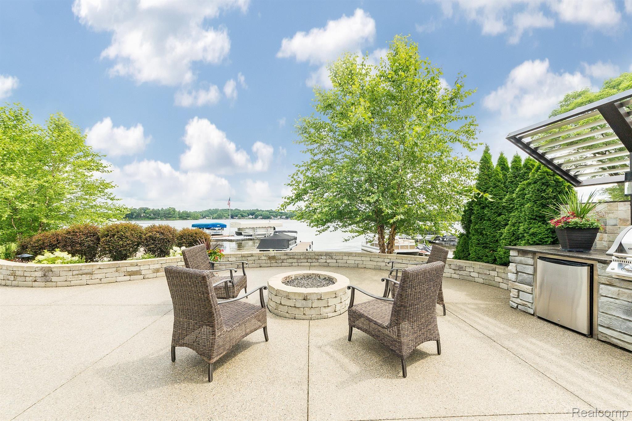 8309 Hilton Road Brighton, MI 48114 - Photo 46 of 56 Built in natural gas firepit