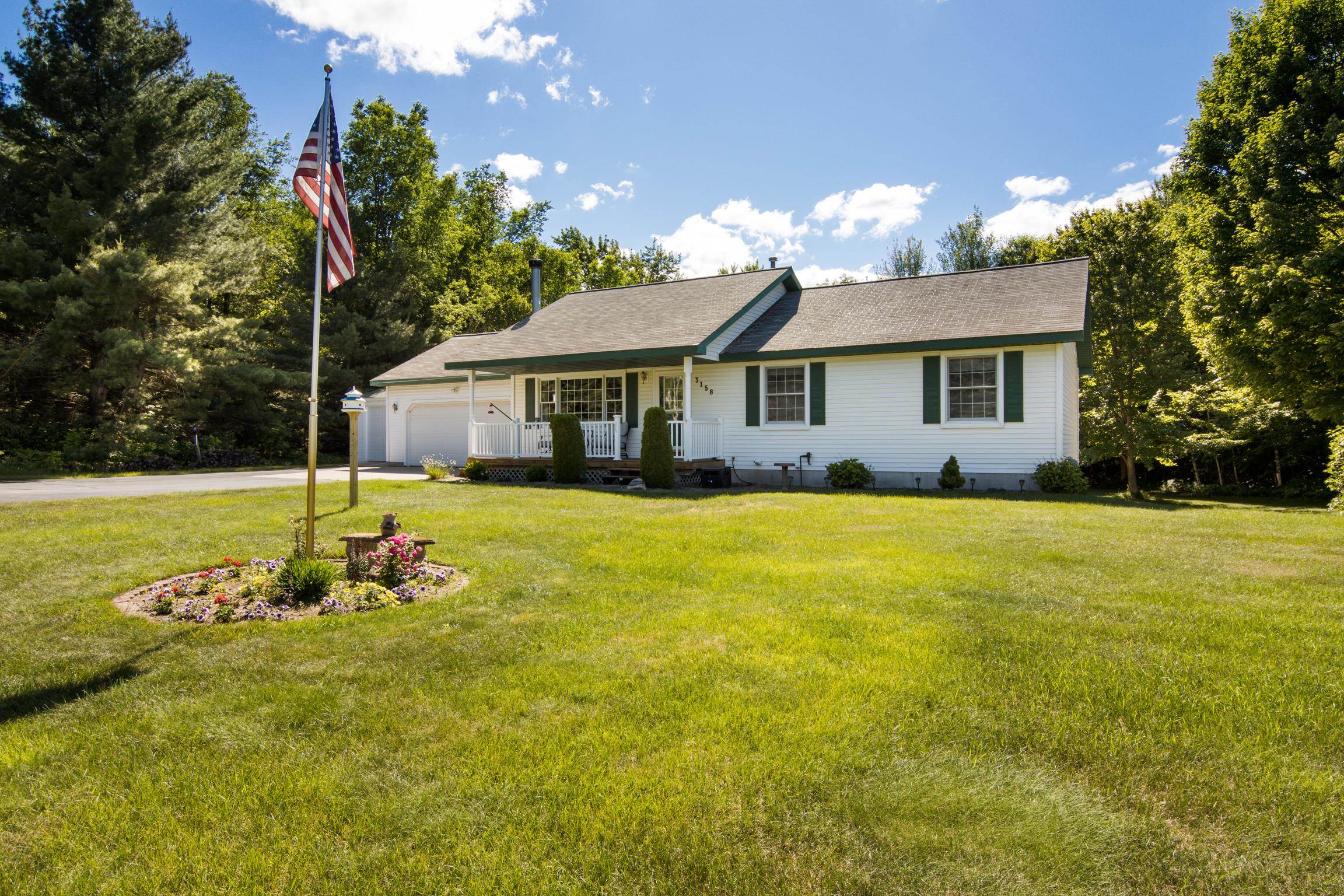 3158 East Duck Lake Road Grawn, MI 49637 - Photo 1 of 37