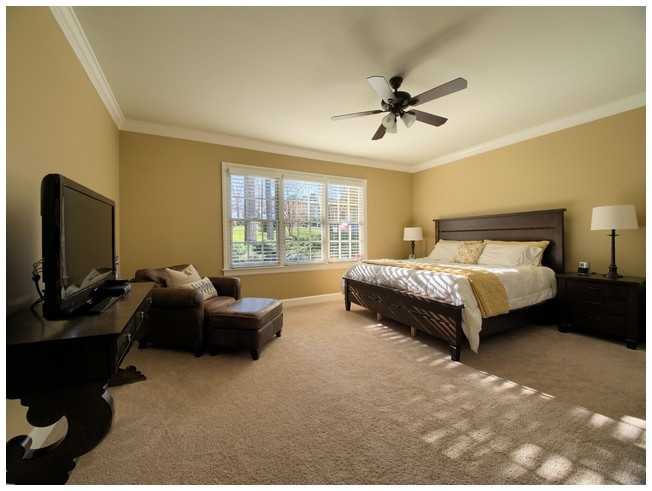 8000 Kukui Court Raleigh, NC 27613 - Photo 14 of 25 Generously sized master suite with large walk-in closet. Master Bedroom