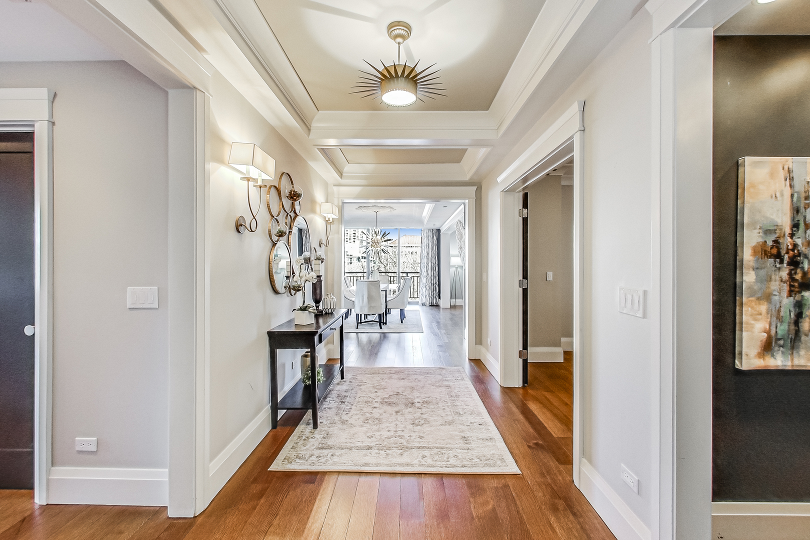 55 West Delaware Place, Unit 620 Chicago, IL 60610 - Photo 2 of 48 a view of a hallway with a livingroom