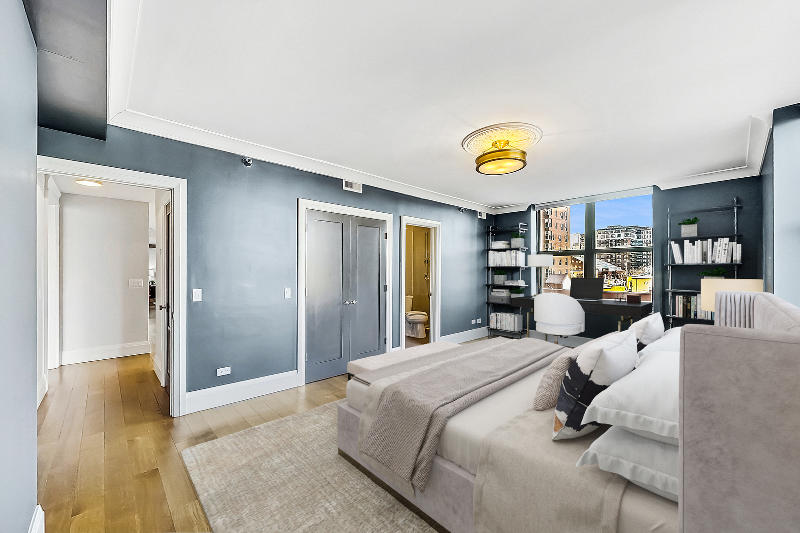 55 West Delaware Place, Unit 620 Chicago, IL 60610 - Photo 34 of 48 a bedroom with a bed and a chandelier