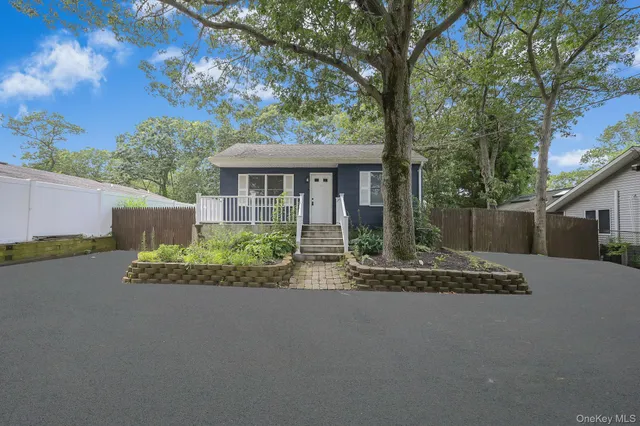 a view of a backyard with a small cabin