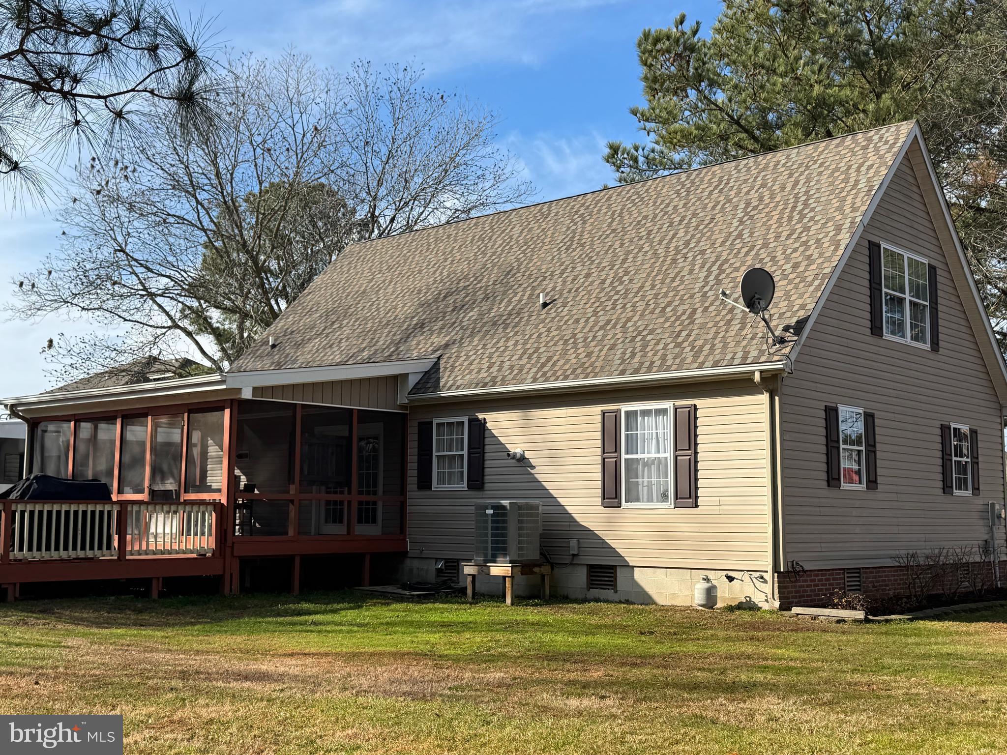 26759 Old State Road Crisfield, MD 21817 - Photo 13 of 17 a view of a house with a swimming pool