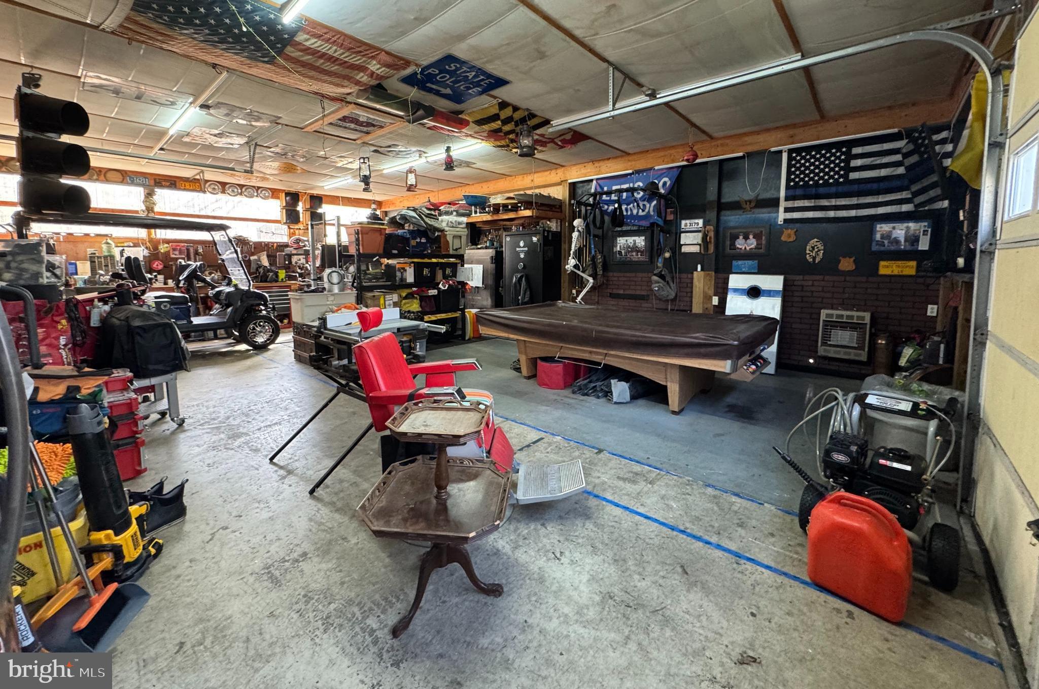 26759 Old State Road Crisfield, MD 21817 - Photo 15 of 17 a view of a garage with storage