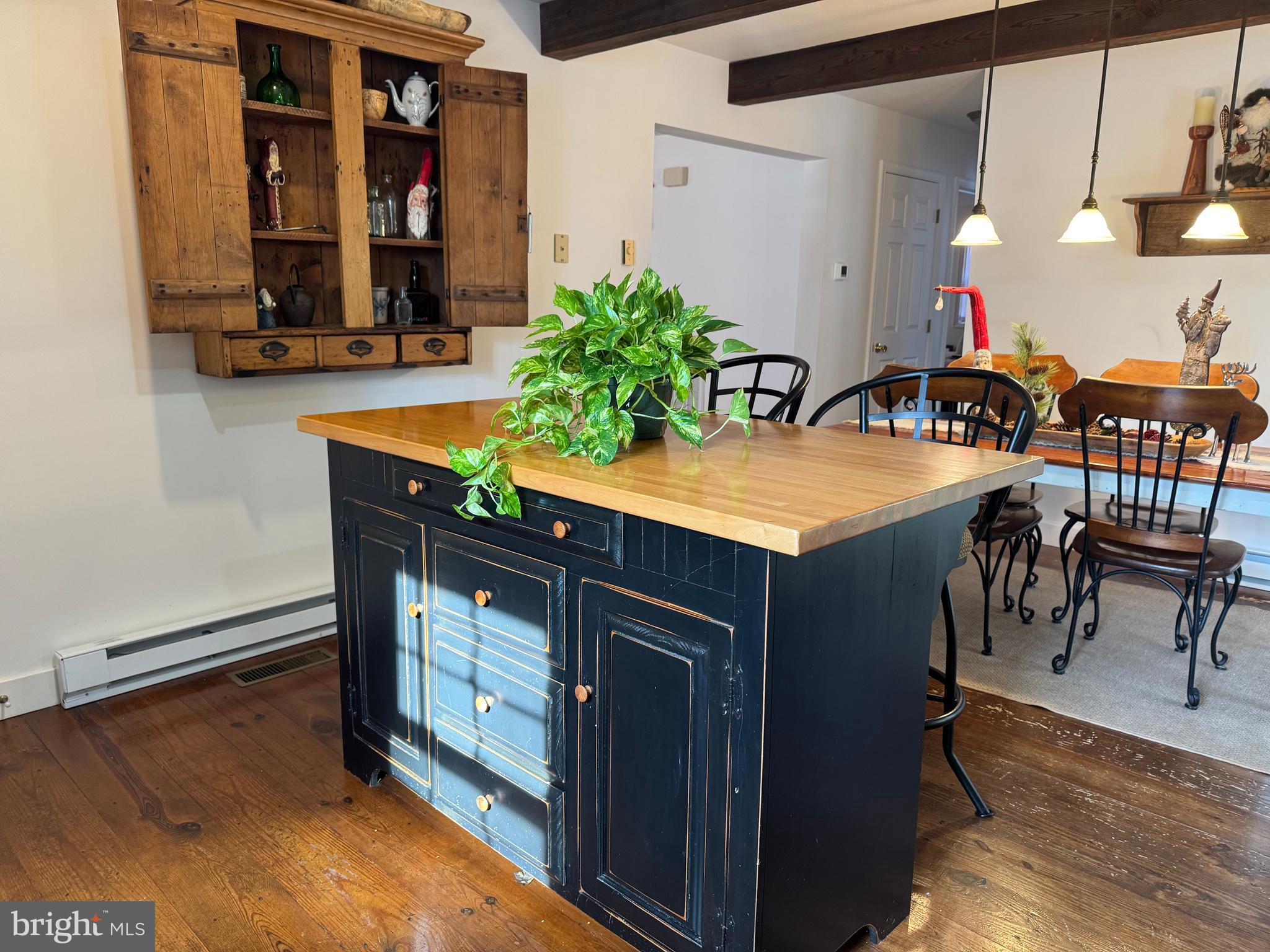 26759 Old State Road Crisfield, MD 21817 - Photo 8 of 17 a room with furniture a chandelier and a rug