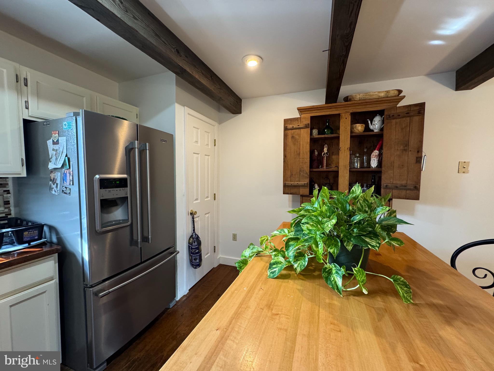 26759 Old State Road Crisfield, MD 21817 - Photo 9 of 17 a view of a refrigerator in the kitchen