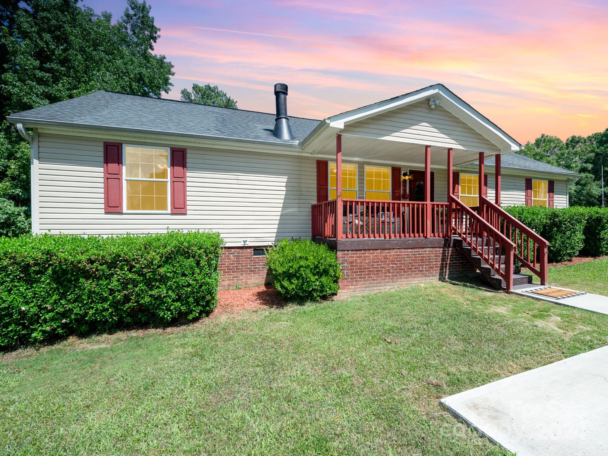408 Rhea Road York, SC 29745 - Photo 1 of 34 front view of a house with a yard