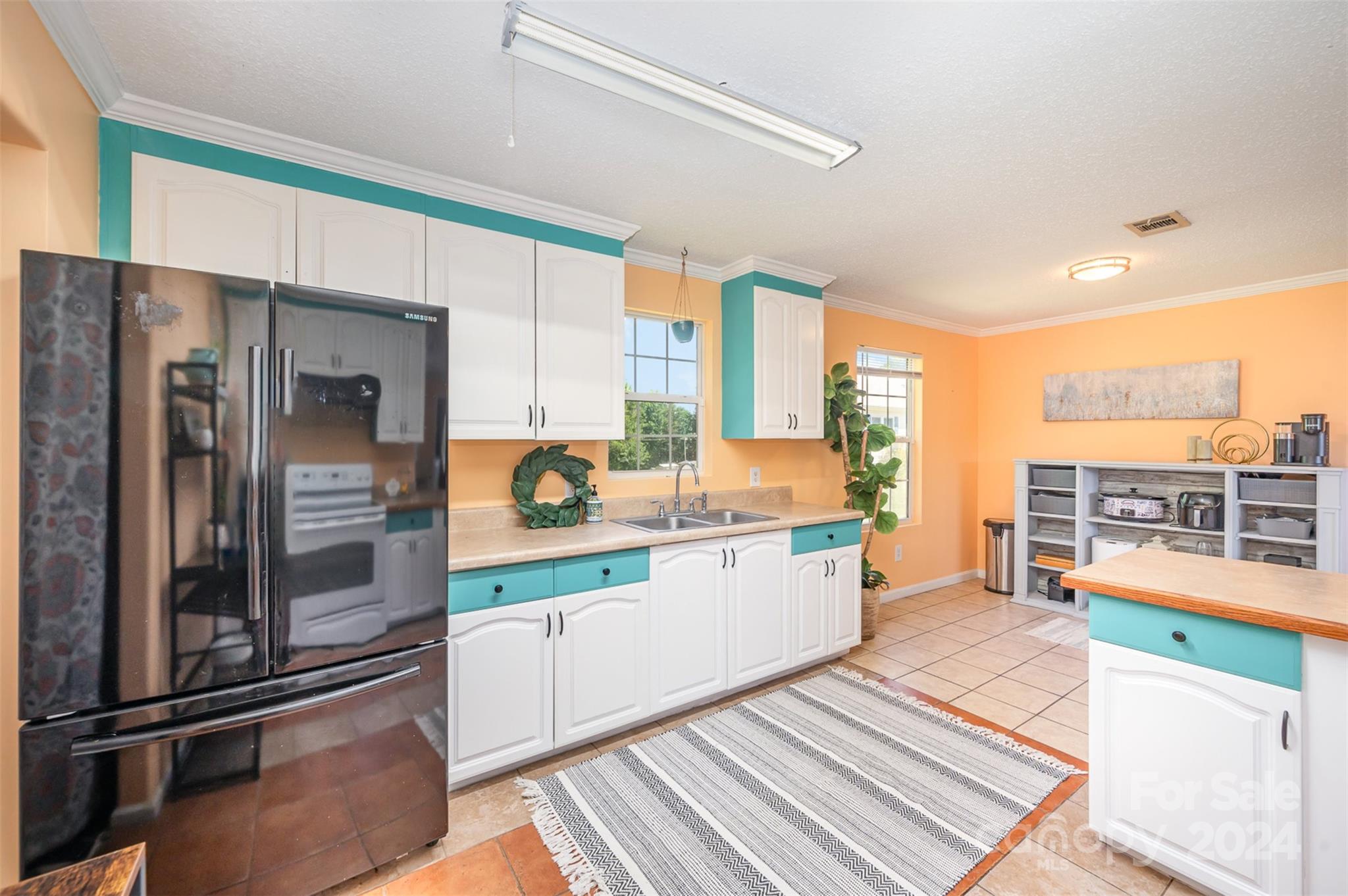 408 Rhea Road York, SC 29745 - Photo 15 of 34 a kitchen with stainless steel appliances a refrigerator and a stove