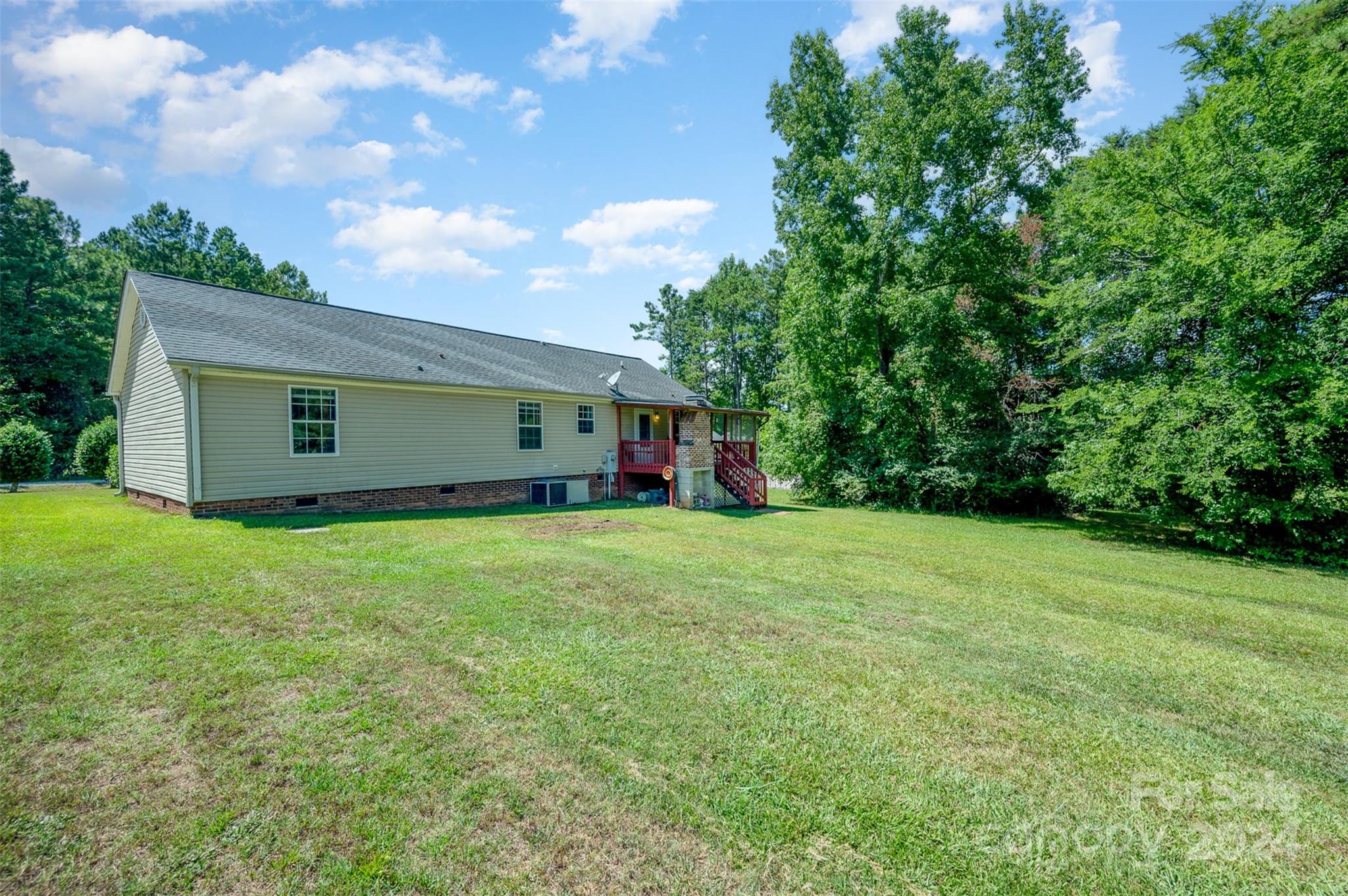 408 Rhea Road York, SC 29745 - Photo 27 of 34 a view of a backyard with a garden