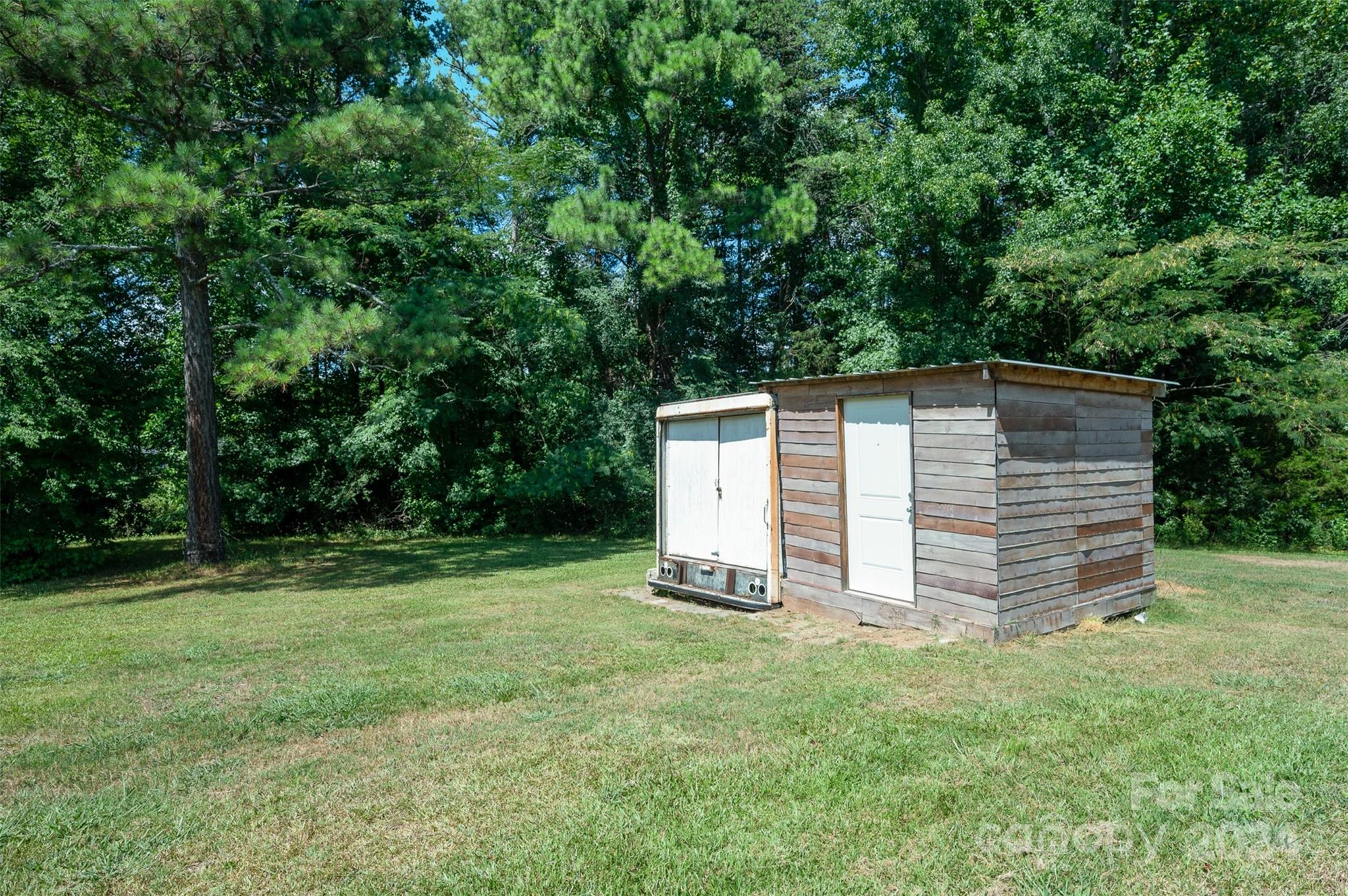 408 Rhea Road York, SC 29745 - Photo 29 of 34 a view of a tiny house with a yard