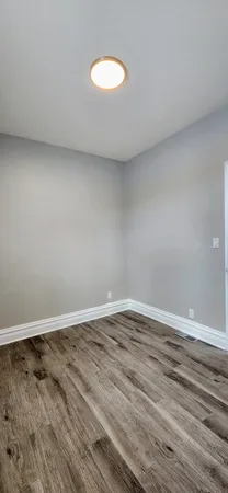 a bathroom with a toilet a sink and bathtub