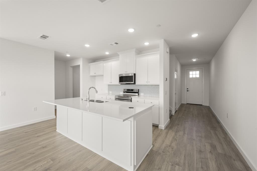 4611 Hawks Trail Oak Point, TX 75068 - Photo 5 of 40 4611 Haws Trail_ 2570_Lotus- Kitchen-1