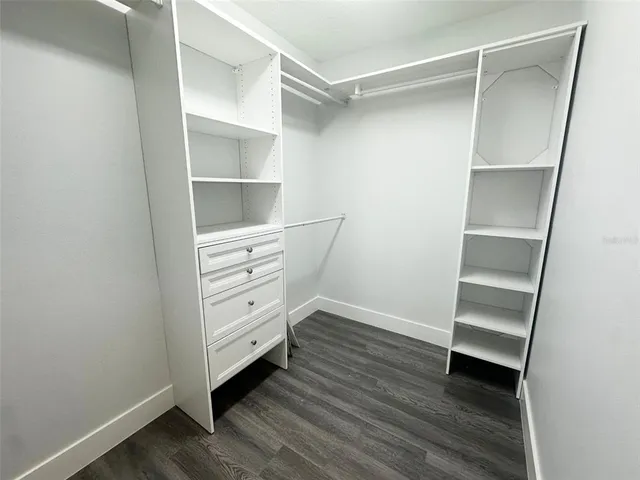 a view of an empty walk in closet