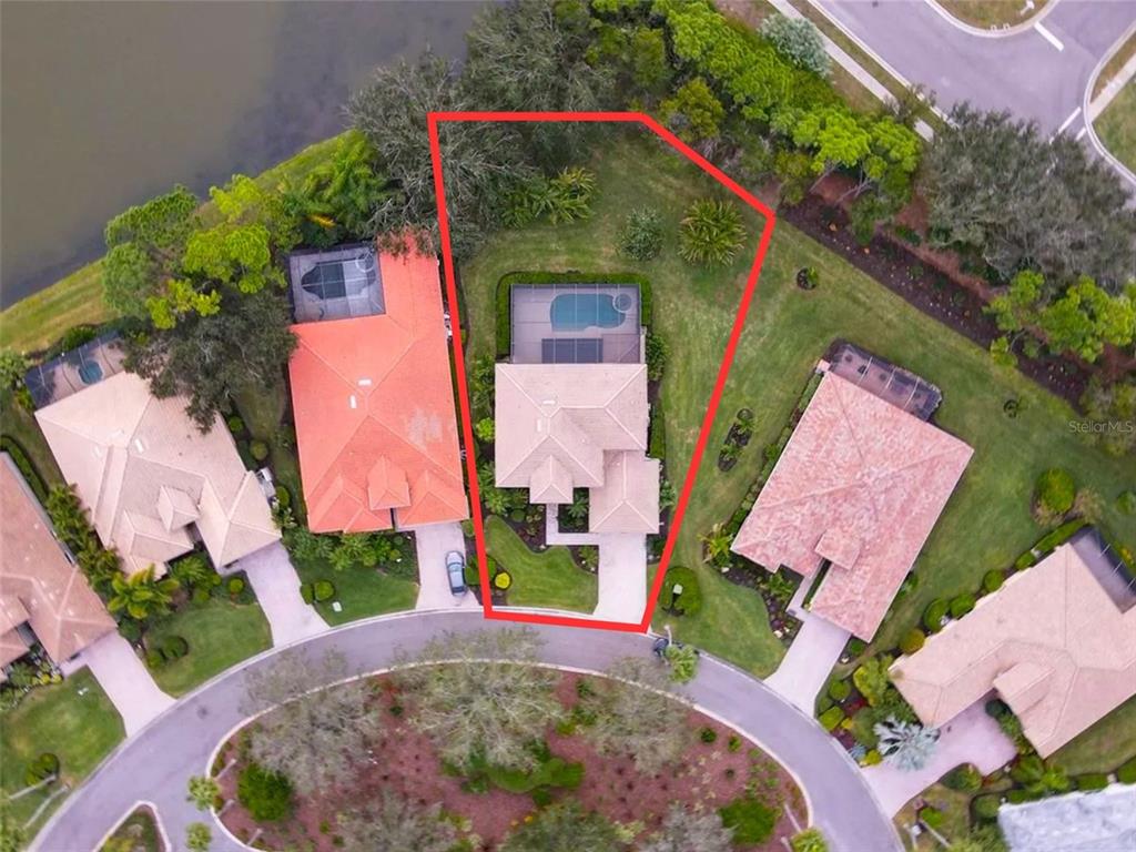 7724 US Open Loop Lakewood Ranch, FL 34202 - Photo 2 of 40 an aerial view of a house