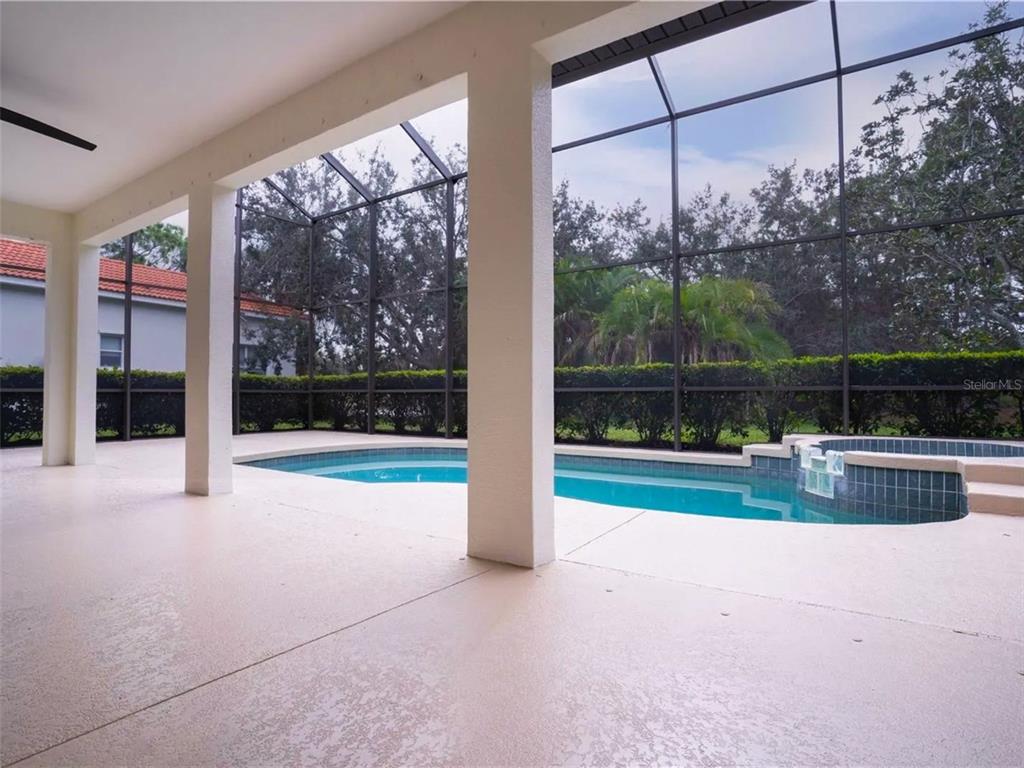 7724 US Open Loop Lakewood Ranch, FL 34202 - Photo 34 of 40 a view of swimming pool with a yard