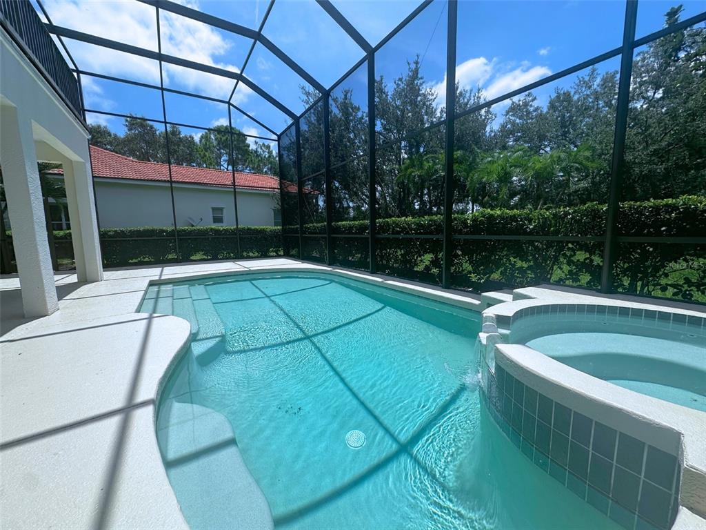 7724 US Open Loop Lakewood Ranch, FL 34202 - Photo 37 of 40 a view of a swimming pool with a patio