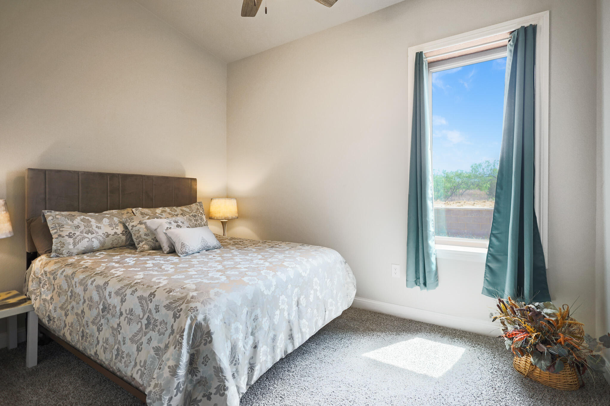 301 Fagan Road Snyder, TX 79549 - Photo 63 of 102 a bedroom with a bed and a window
