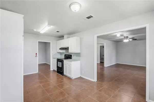 a view of a kitchen with electric equipment