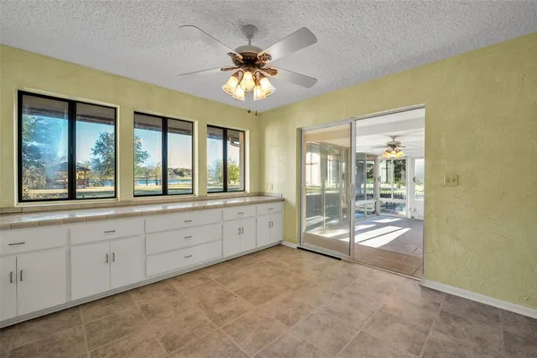 a large white room with a large window