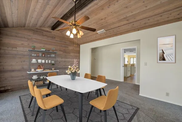 a view of a dining room with furniture