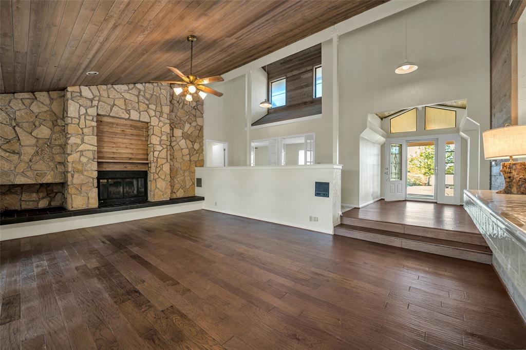16753 Rolling Hills Lane Forney, TX 75126 - Photo 5 of 32 a view of livingroom with hardwood floor and a ceiling fan