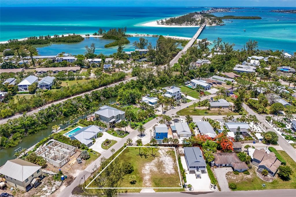 591 Russell Street Longboat Key, FL 34228 - Photo 1 of 19 an aerial view of residential houses with outdoor space