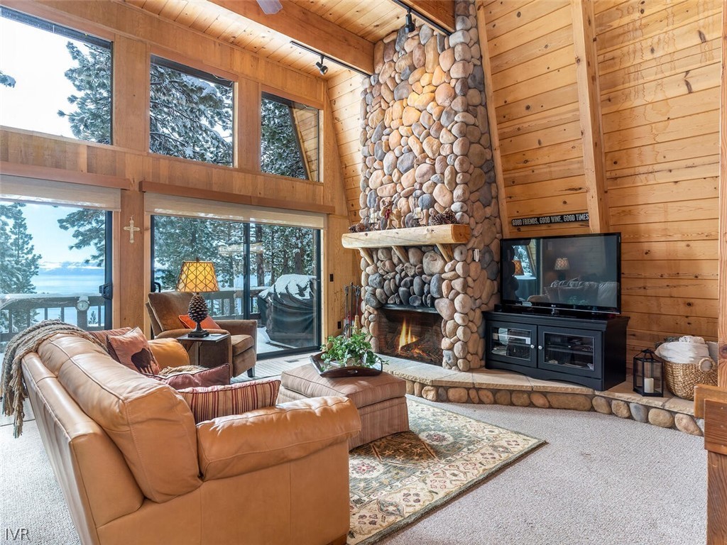 825 Tyner Way Incline Village, NV 89451 - Photo 2 of 20 Massive River Rock Fireplace and wood beamed ceili