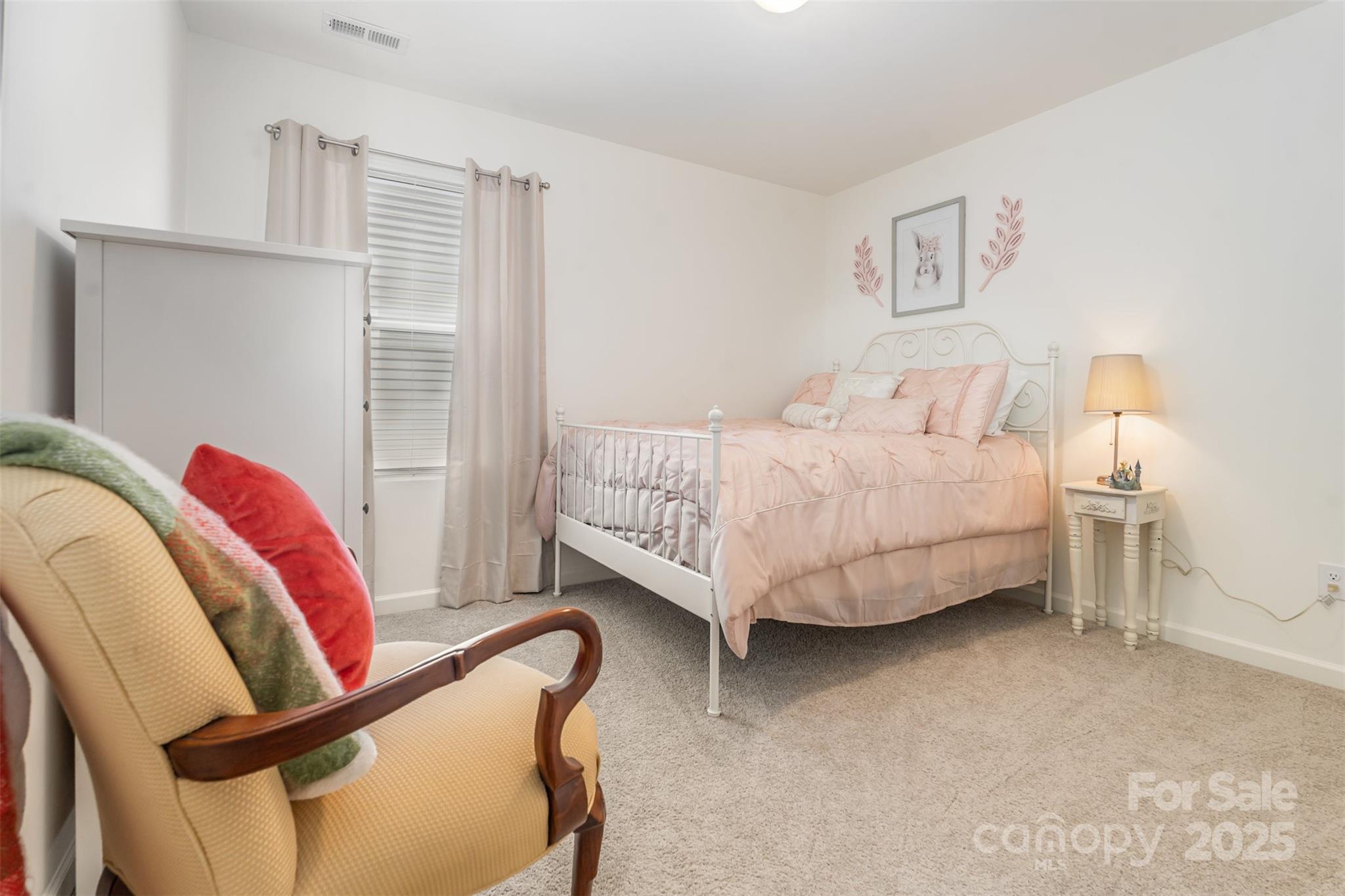 204 Shay Xing Road Salisbury, NC 28146 - Photo 16 of 22 a bedroom with a bed couch and a window