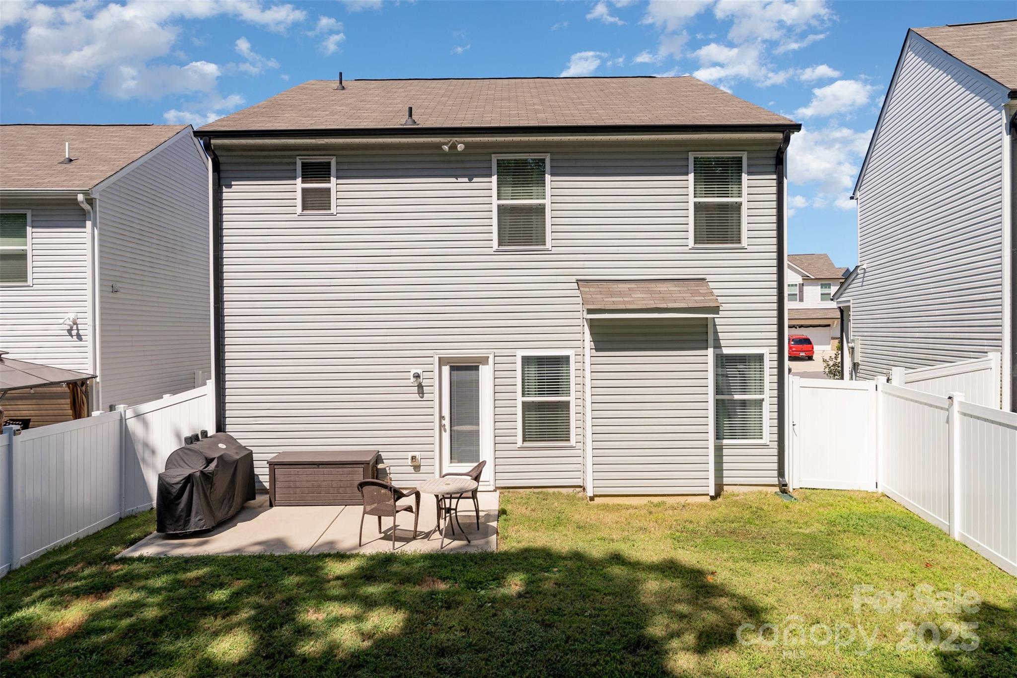 204 Shay Xing Road Salisbury, NC 28146 - Photo 19 of 22 a backyard of a house with table and chairs