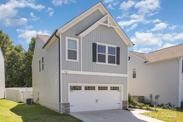 a view of a yard in front of a house
