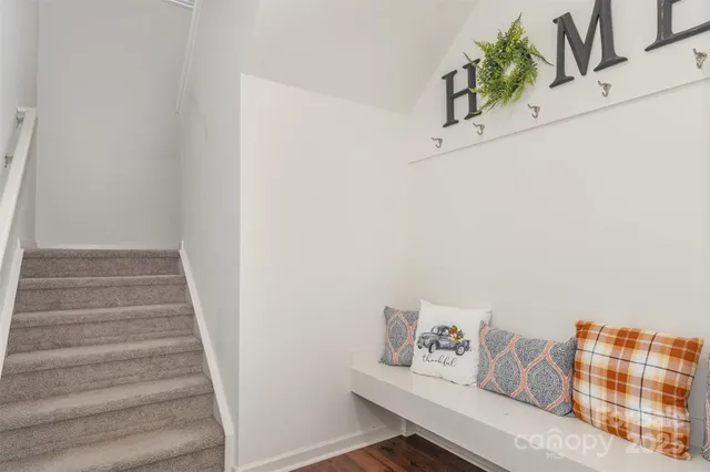 a view of entryway with stairs