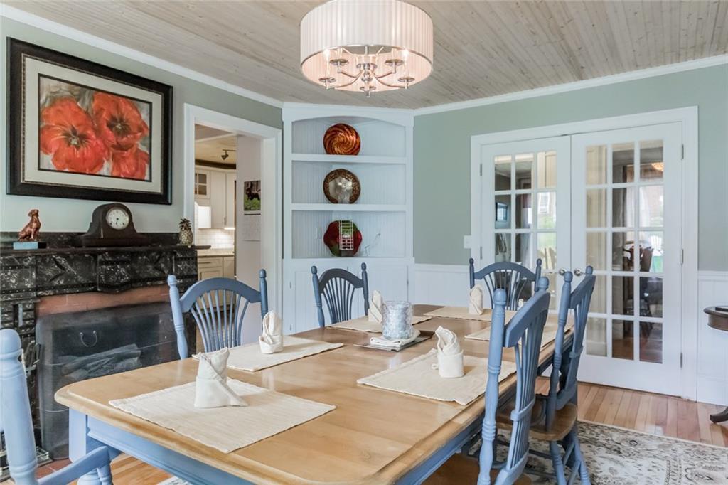 19 Capisic Street Portland, ME 04102 - Photo 20 of 35 Dining room with fireplace and built ins