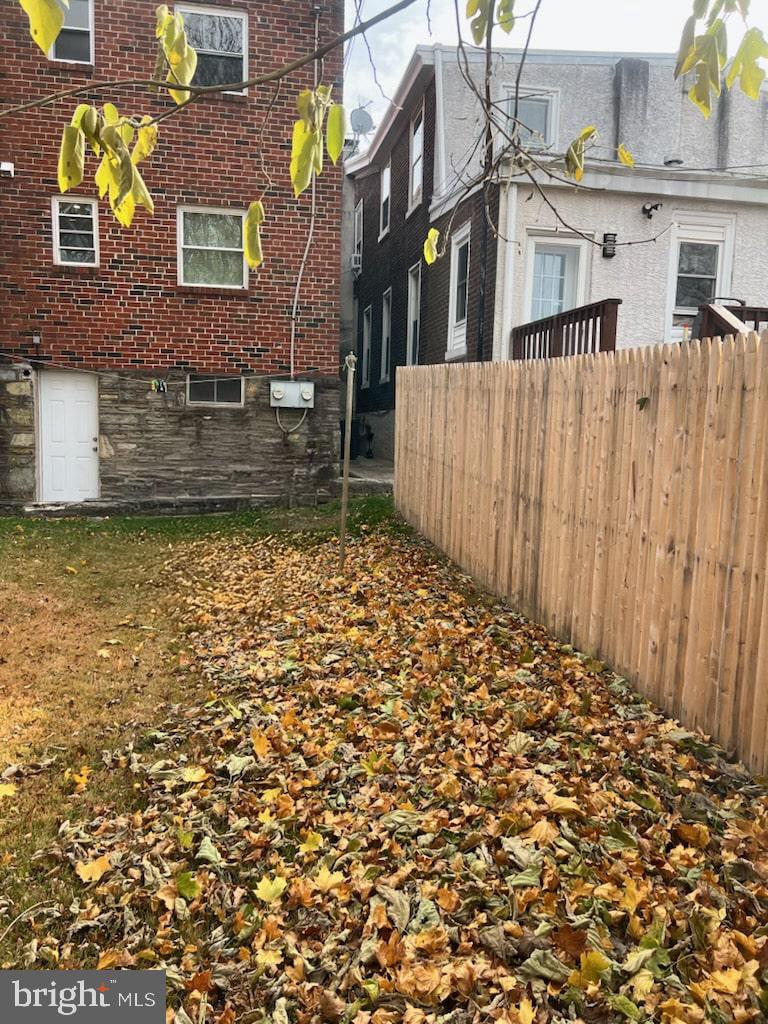 362 Ripka Street Philadelphia, PA 19128 - Photo 17 of 18 a view of a house with a wooden fence