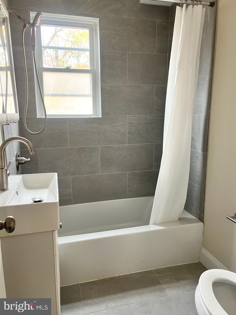 362 Ripka Street Philadelphia, PA 19128 - Photo 9 of 18 a white bath tub sitting next to a white sink