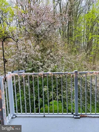 a view of a balcony with an outdoor space