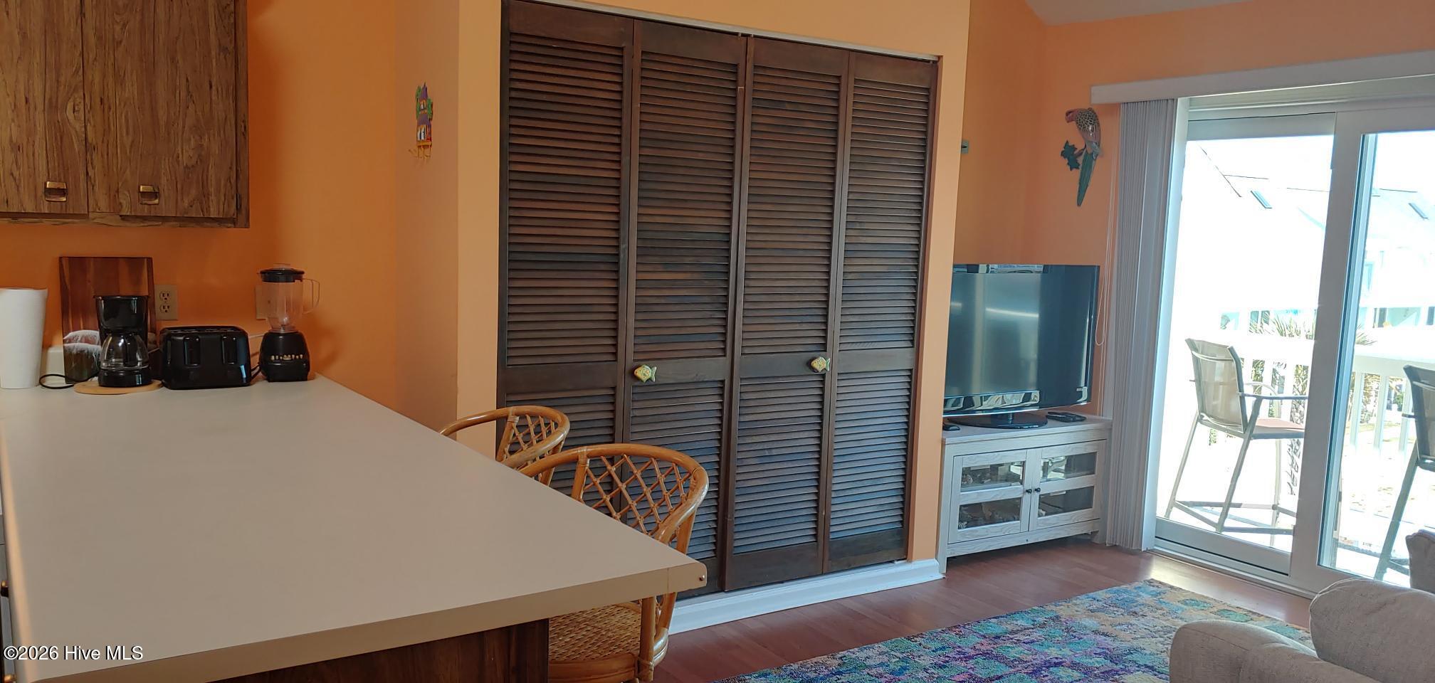 9201 Coast Guard Road, Unit F302 Emerald Isle, NC 28594 - Photo 15 of 22 Murphy Bed Closet