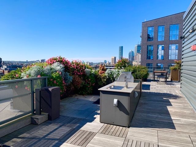 a view of a terrace with furniture