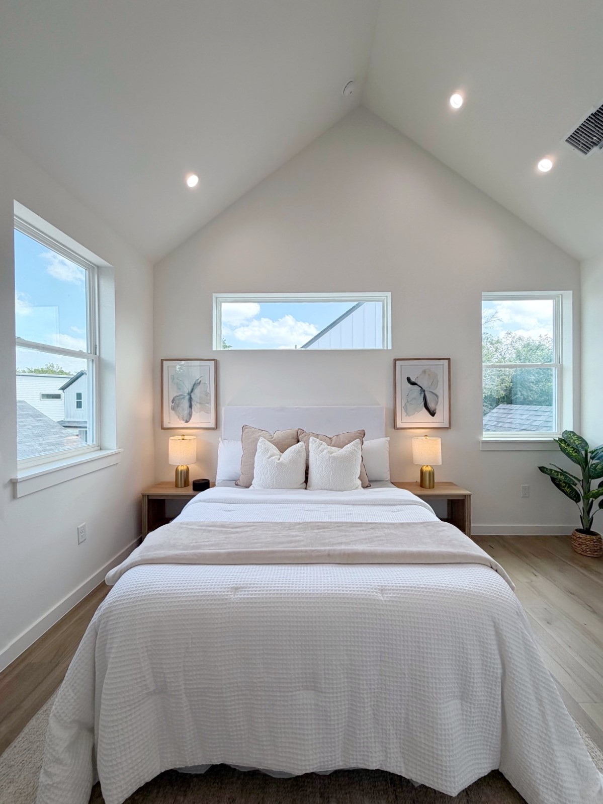 6809 Porter Street, Unit 1 Austin, TX 78741 - Photo 5 of 10 Soaring vaulted ceilings and abundant natural light create a serene retreat in this inviting primary bedroom.