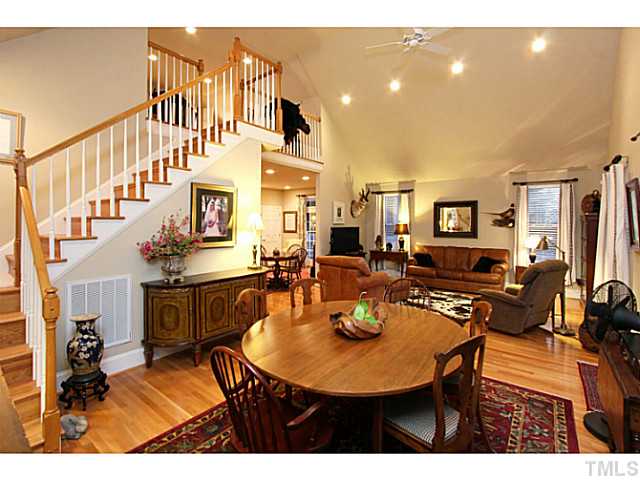 803 Fieldstone Road Roxboro, NC 27574 - Photo 6 of 25 a view of a dining room with furniture and a kitchen
