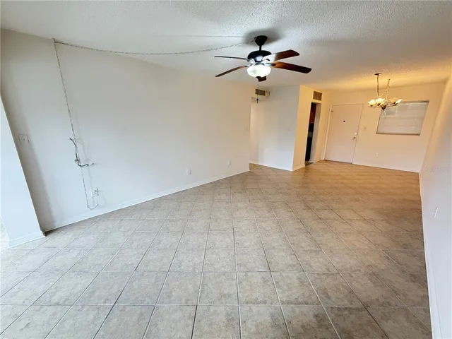 a view of a livingroom with a ceiling fan