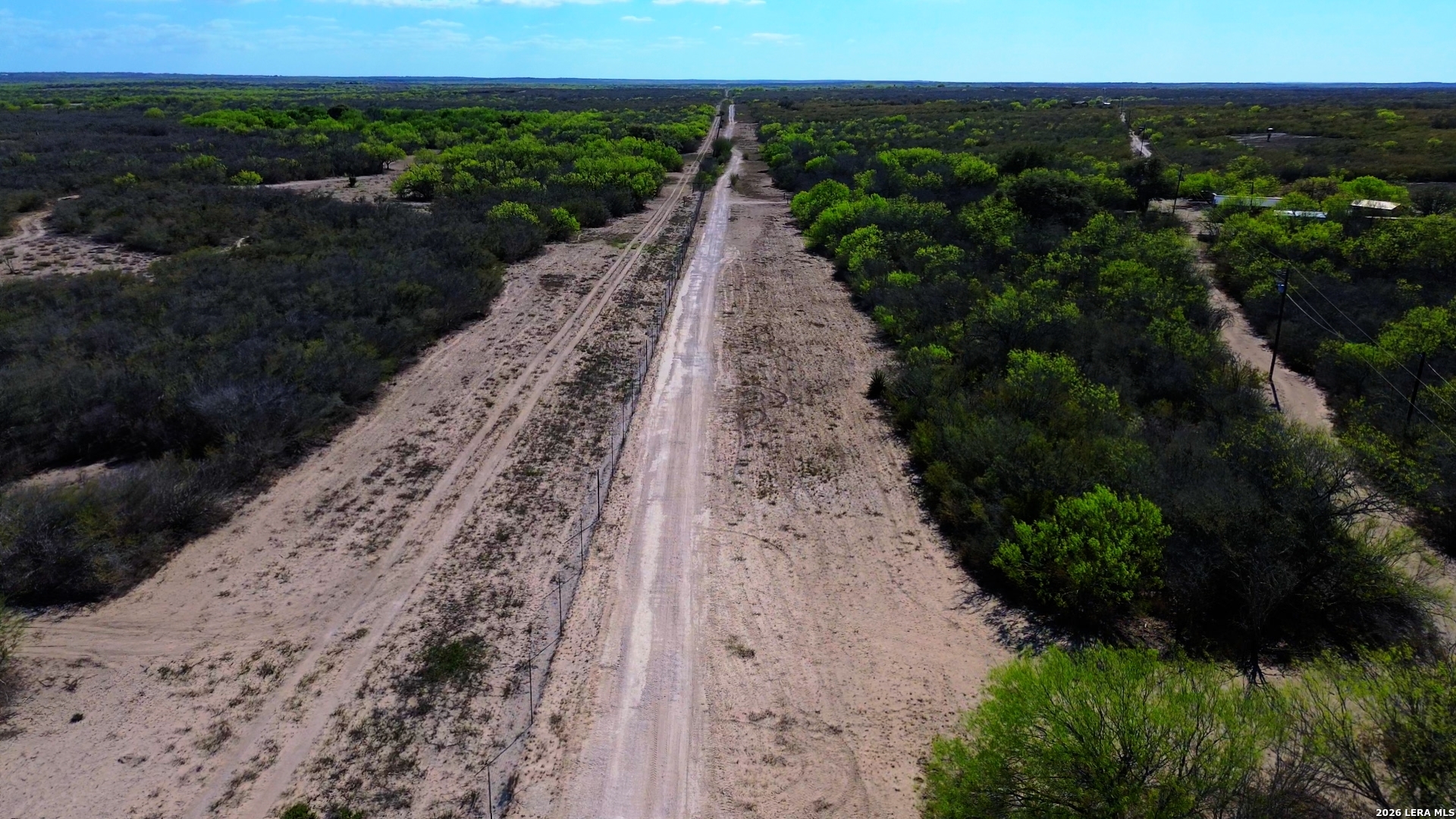 128 Salyer George George West, TX 78022 - Photo 3 of 18 a view of a pathway with a park