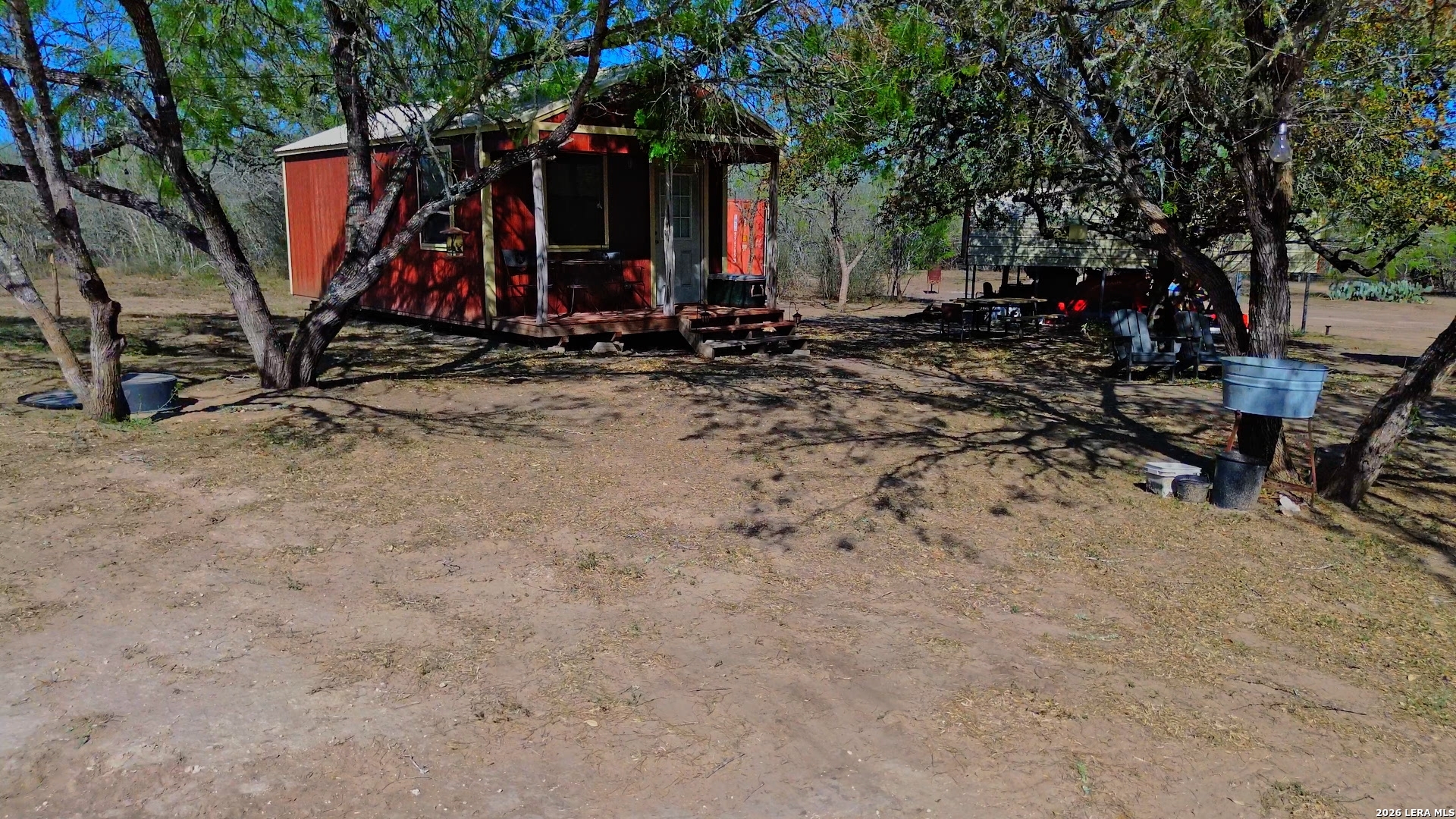 128 Salyer George George West, TX 78022 - Photo 7 of 18 a view of a backyard with palm trees