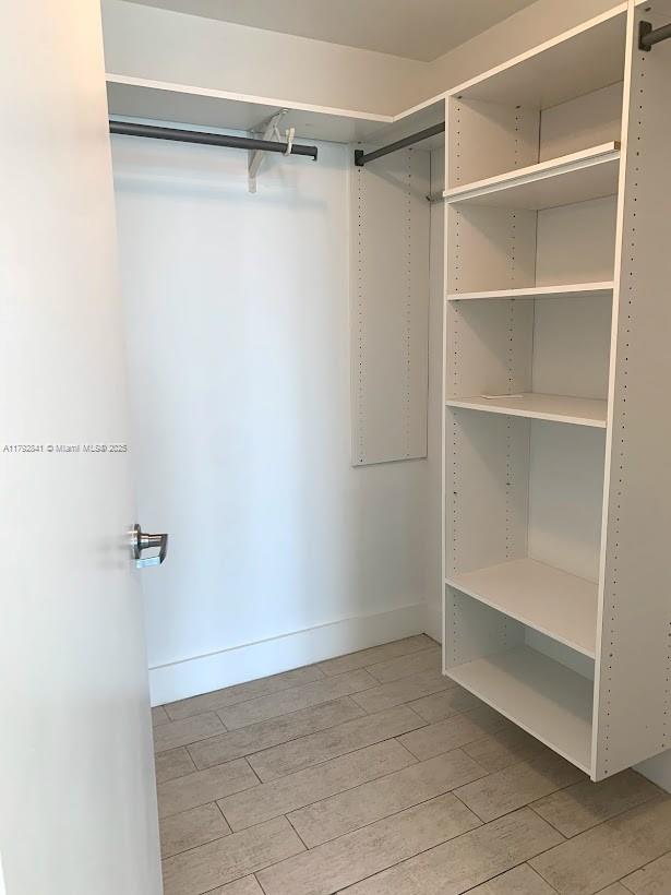 92 Southwest 3rd Street, Unit 3903 Miami, FL 33130 - Photo 10 of 25 a view of an empty walk in closet