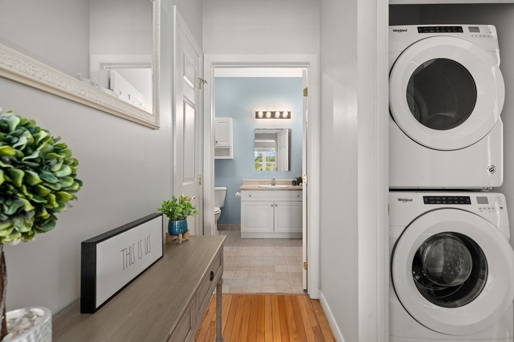 8 Walnut Street, Unit 406 Peabody, MA 01960 - Photo 24 of 31 a view of a hallway with washer and dryer