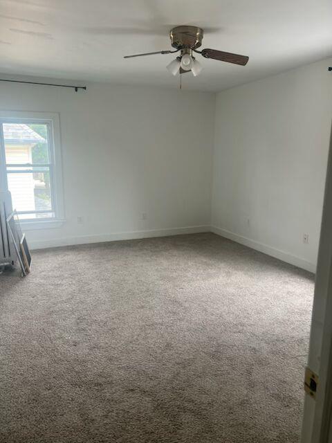 25 Ridge Street Middletown, NY 10940 - Photo 5 of 10 Spare room featuring carpet floors and ceiling fan