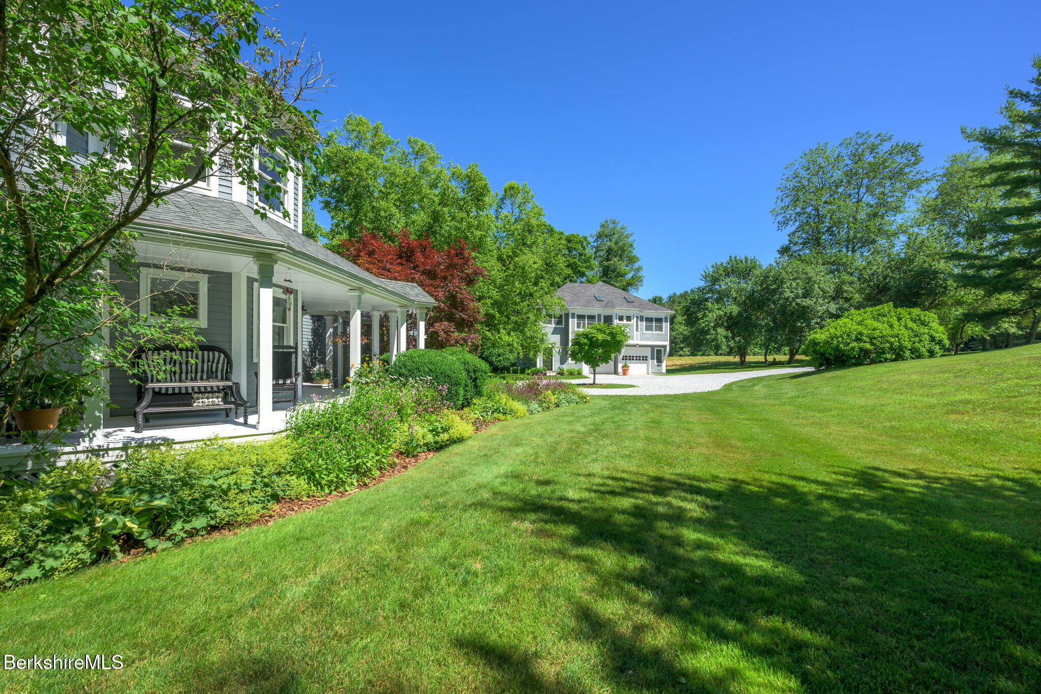 176 West Center Road West Stockbridge, MA 01266 - Photo 7 of 57 a view of house with a big yard and potted plants and large trees