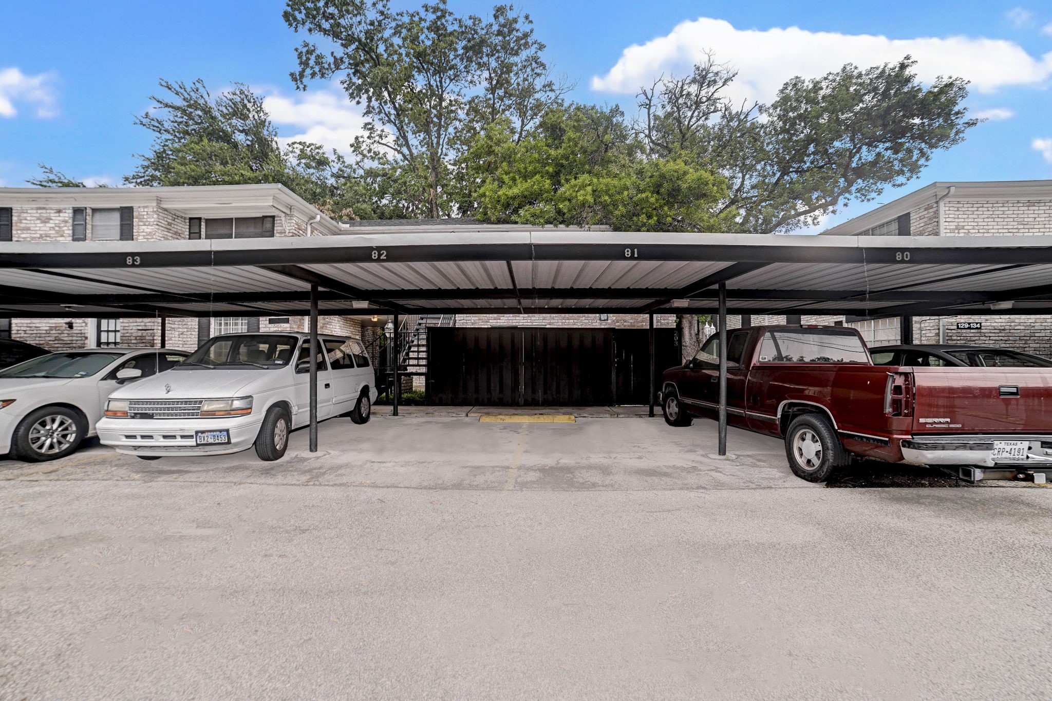 7900 Westheimer Road, Unit 202 Houston, TX 77063 - Photo 25 of 27 a view of a car parked in garage