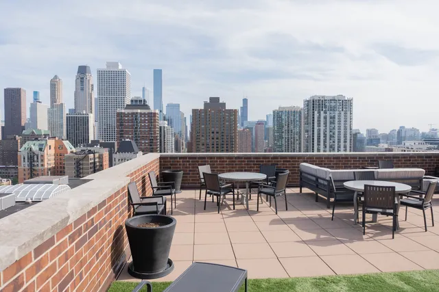 a view of a terrace with sitting area